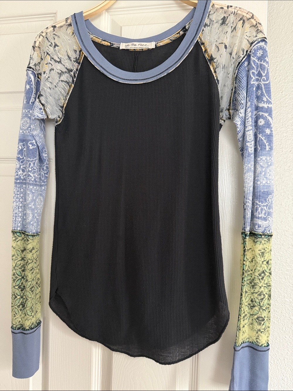 We The Free Black Long Sleeve Raglan Top with Blue and Green Printed Sleeves